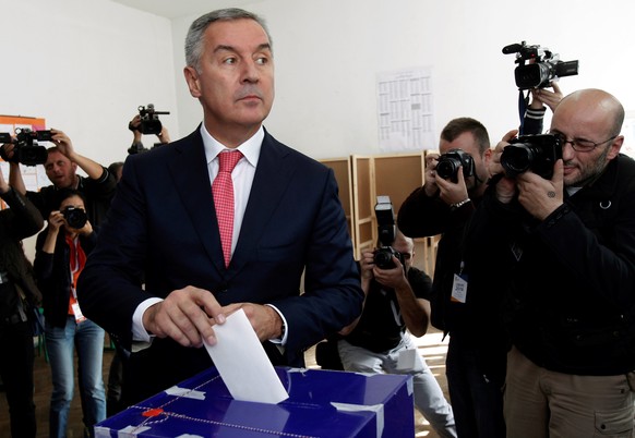 Montenegrin Prime Minister and leader of ruling Democratic Party of Socialists, Milo Djukanovic, casts his ballot at a polling station in Podgorica, Montenegro, October 16, 2016. REUTERS/Stevo Vasilje ...