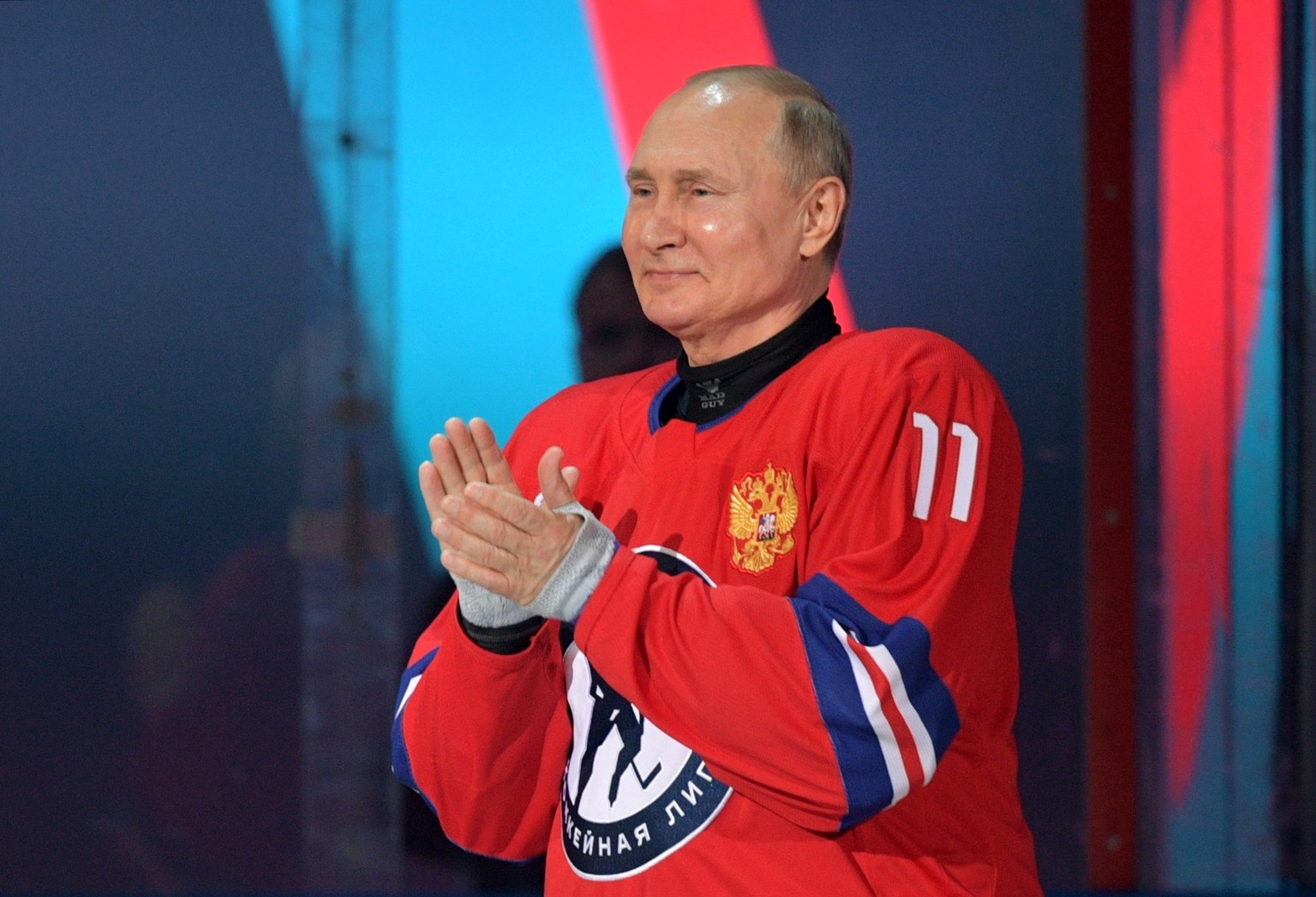 Russian President Vladimir Putin attends a gala match with the participation of Russian hockey legends as part of the final stage of the X All-Russian Night Hockey League festival in the Bolshoi Ice P ...