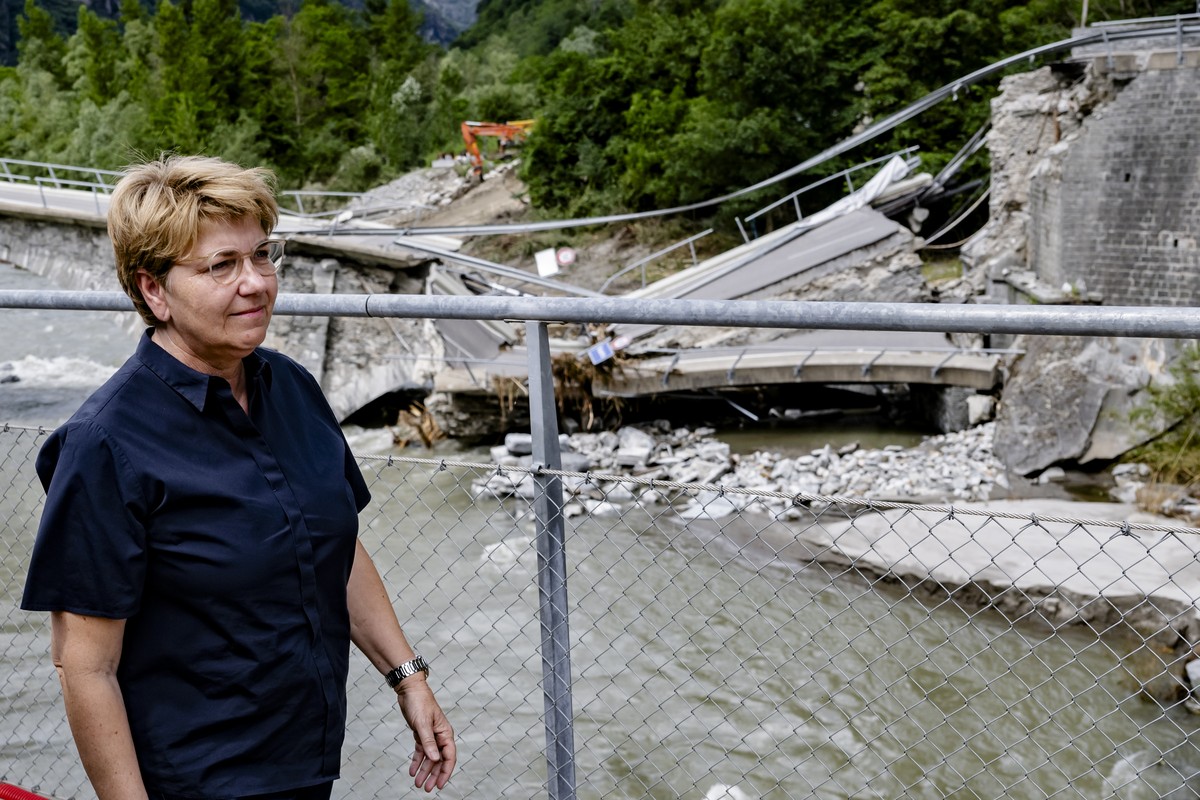 Swiss Federal President Viola Amherd visits regions hit by bad weather, in Visletto, Maggia Valley, Switzerland, Monday, July 1, 2024. Severe storms and torrential rain in Switzerland over the weekend ...