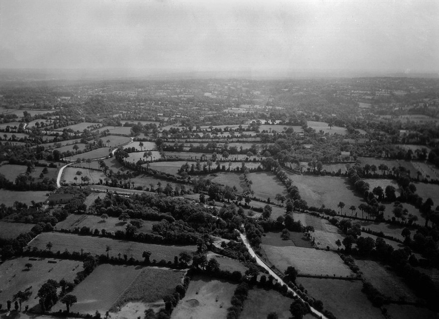 Aerial view of the hedgerows of Normandy. The ancient landscape provided a maze like battlefield with barriers that blocked vision and tanks. Ca. 1944. France, World War 2. BSLOC2014291 Courtesy Evere ...
