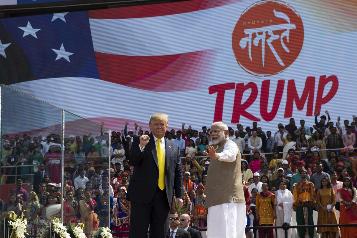 U.S. President Donald Trump and Indian Prime Minister Narendra Modi wave after a "Namaste Trump," event at Sardar Patel Gujarat Stadium, Monday, Feb. 24, 2020, in Ahmedabad, India. India pou ...