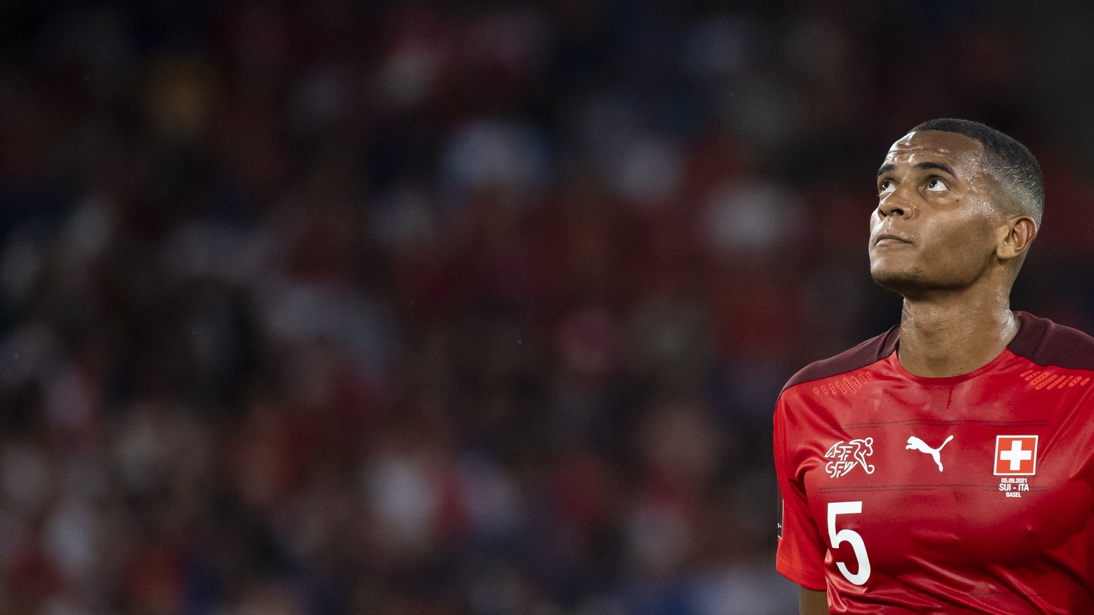 Switzerland&#039;s Manuel Akanji, reacts during the 2022 FIFA World Cup European Qualifying Group C soccer match between Switzerland and Italy at the St. Jakob-Park stadium in Basel, Switzerland, on S ...