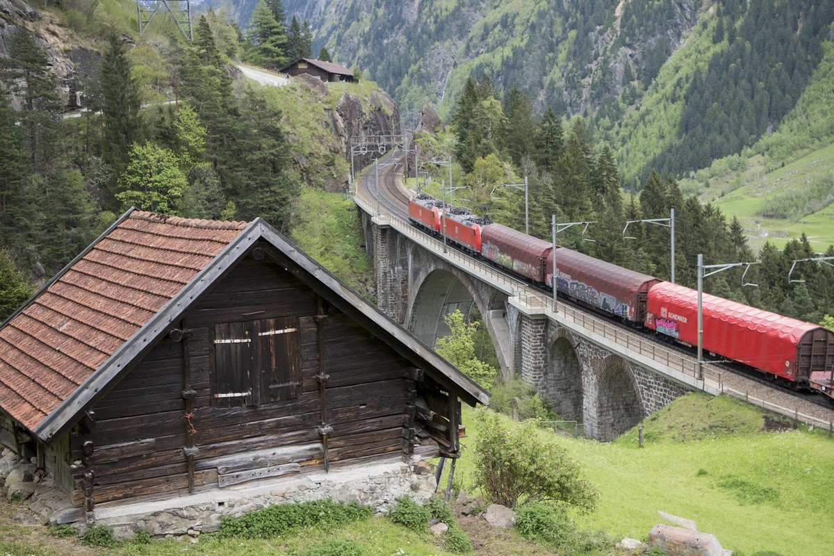 A cargo train travels on the northern Gotthard mountain section between Erstfeld and Goeschenen, pictured in Wassen, Canton of Uri, Switzerland, on May 11, 2016. The opening of the new Gotthard Base T ...