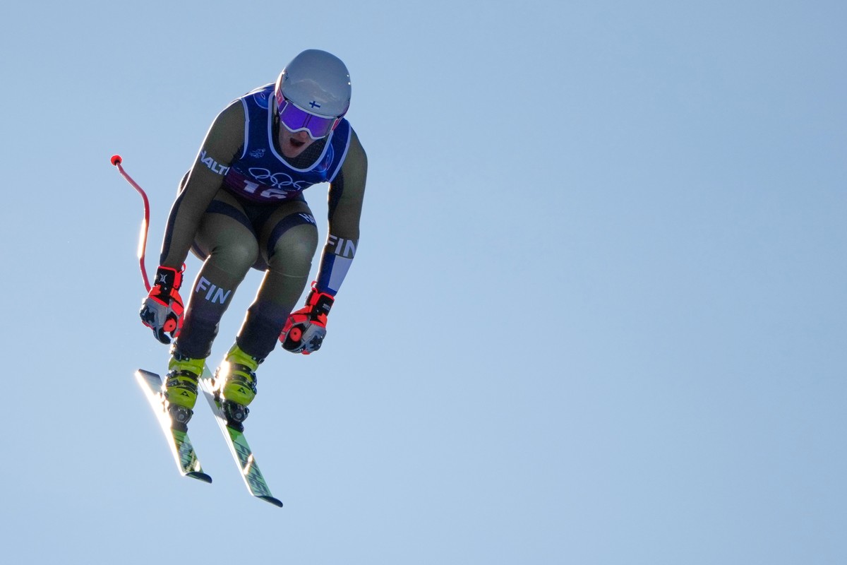 Finland's Elian Lehto speeds down the course of an alpine ski men's downhill portion of a team combined race, at the 2026 Winter Olympics, in Bormio, Italy, Monday, Feb. 9, 2026. (AP Photo/J ...