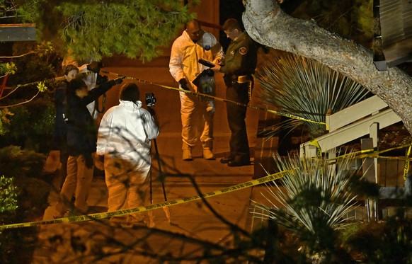 A forensics team works the scene Thursday, Nov. 8, 2018, in Thousand Oaks, Calif. where a gunman opened fire Wednesday inside a country dance bar crowded with hundreds of people on &quot;college night ...