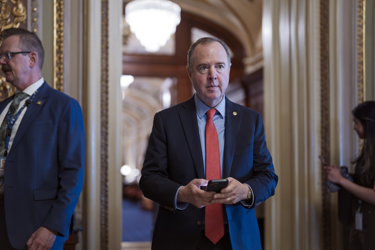 Sen. Adam Schiff, D-Calif., arrives as Senate Democrats gather behind closed doors to mount a last-ditch protest over a Republican-led spending bill that already passed the House, at the Capitol in Wa ...