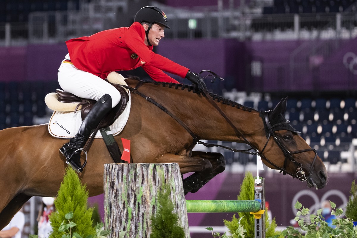 Daniel Deusser of Germany riding Killer Queen competes in the equestrian team jumping final at the 2020 Tokyo Summer Olympics in Tokyo, Japan, on Saturday, August 07, 2021. (KEYSTONE/Peter Klaunzer)