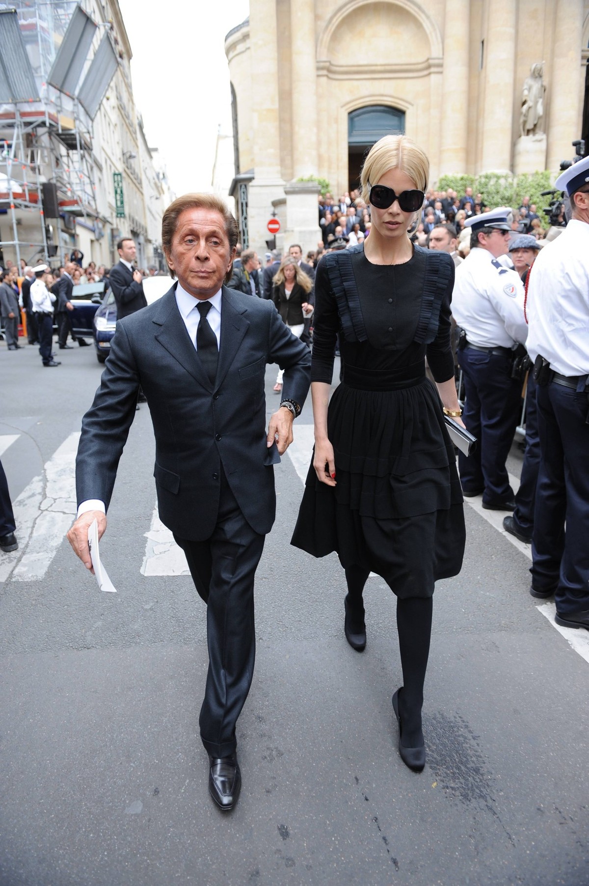 Funeral of French designer Yves Saint Laurent - Paris Valentino and Claudia Schiffer attend the funeral of French designer Yves Saint Laurent at the Saint-Roch church in Paris, France, Thursday, June ...