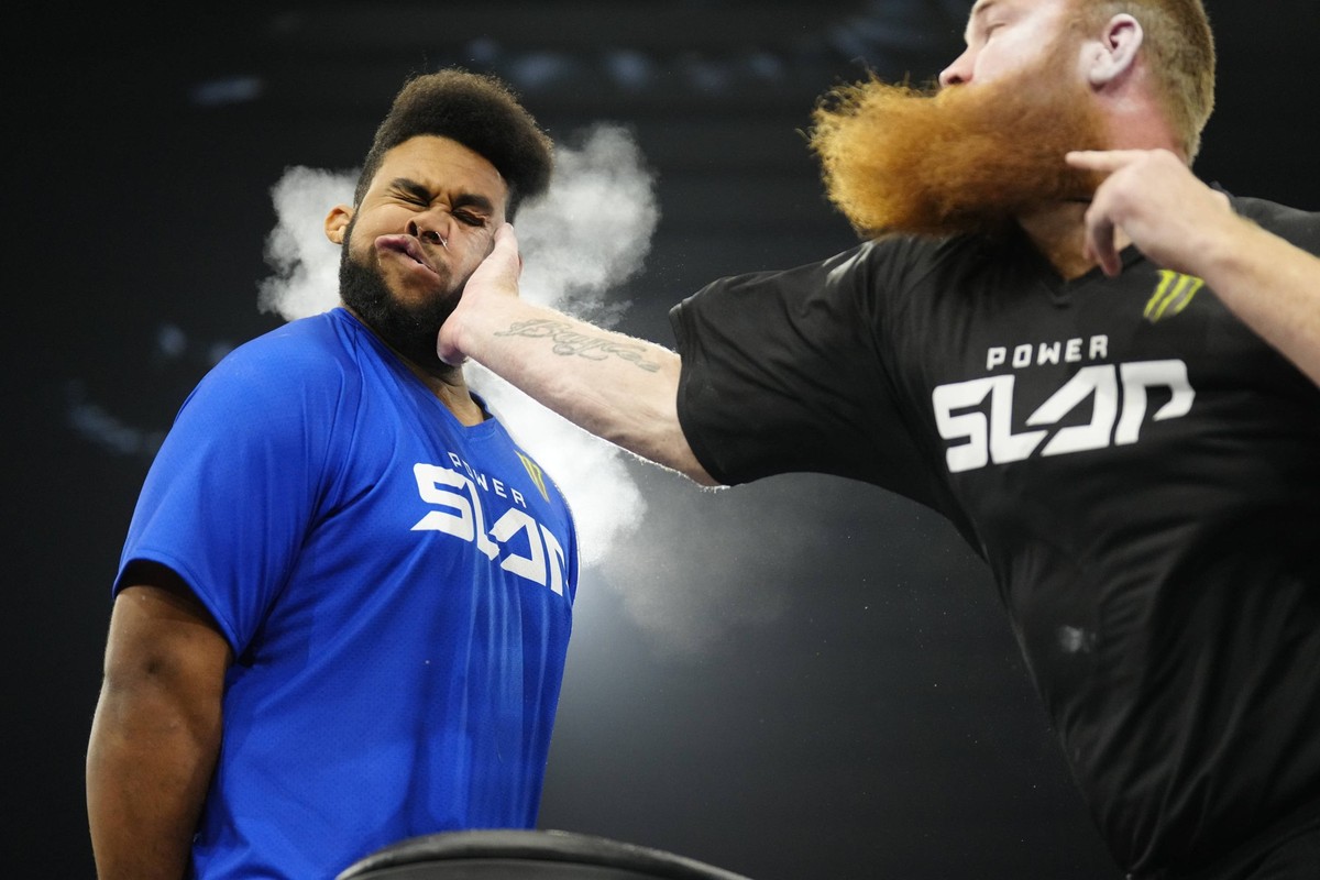 LAS VEGAS, NV - MAY 24: R-L Ron Wolverine Bata slaps Damien The Bell Dibbell in a 5-round bout for Power Slap 2 - Wolverine vs Bell on May 24, 2023, at UFC Apex in Las Vegas, NV. Photo by Louis Grasse ...