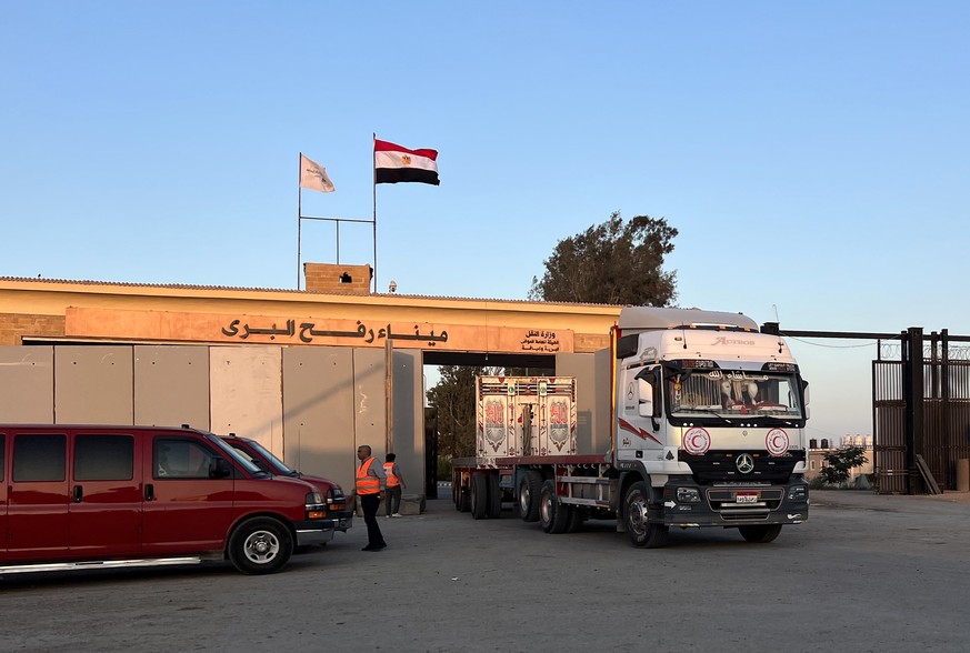 epa10958118 A truck carrying humanitarian aid bound for the Gaza Strip crosses the Rafah border crossing between the Gaza Strip and Egypt, in Rafah, Egypt, on November 4, 2023. According to the agreement...