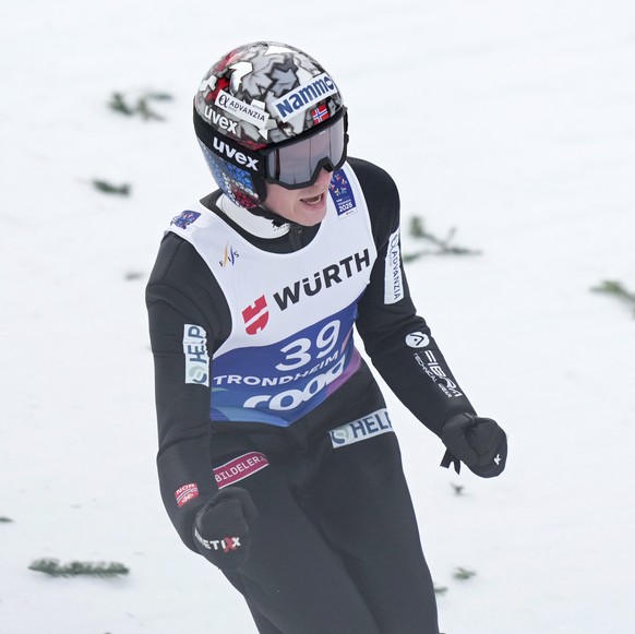 Marius Lindvik, of Norway, reacts after landing his first round jump of the ski jumping men&#039;s large hill individual competition at the Nordic World Ski Championships in Trondheim, Norway, Saturda ...