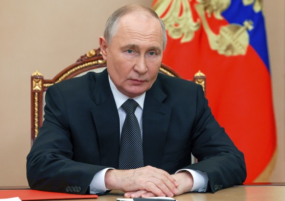 Russian President Vladimir Putin chairs a Security Council meeting via videoconference at the Kremlin in Moscow, Russia, Friday, Nov. 8, 2024. (Vyacheslav Prokofyev, Sputnik, Kremlin Pool Photo via AP ...