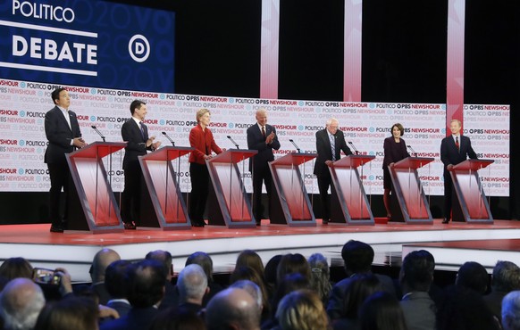 Democratic presidential candidates from left, entrepreneur Andrew Yang, South Bend Mayor Pete Buttigieg, Sen. Elizabeth Warren, D-Mass., former Vice President Joe Biden, Sen. Bernie Sanders, I-Vt., Se ...