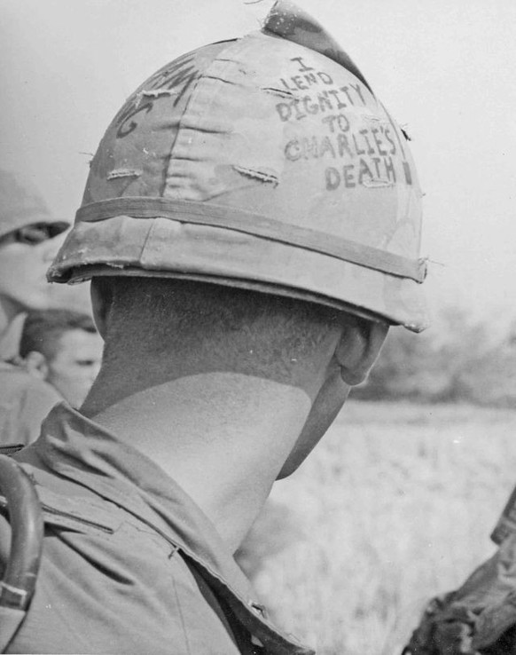 Vietnam war Helmet slogans helmet art helmet graffiti 
https://rarehistoricalphotos.com/helmet-graffiti-vietnam-photos/