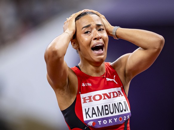 KEYPIX - Ditaji Kambundji of Switzerland reacts after winning gold in the women&#039;s 100 meters hurdles final on day three of the World Athletics Championships Tokyo 2025 at the National Stadium on  ...