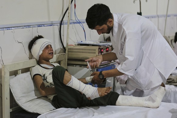 An Afghan boy injured in a powerful earthquake that struck eastern Afghanistan on Sunday receives treatment at Nangarhar Regional Hospital in Jalalabad, Afghanistan, Wednesday, Sept. 3, 2025. (AP Phot ...