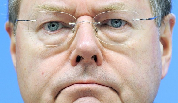 epa01671234 German Finance Minister Peer Steinbrueck looks on during a press conference at the end of the second day of the European Heads of States summit, at the European Union (EU) headquarters, in ...