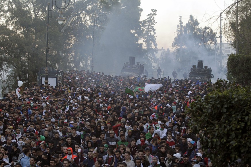 Protesters clash with police in the streets of Algiers, Algeria, during a demonstration denouncing President Abdelaziz Bouteflika&#039;s bid for a fifth term, Friday, March 1, 2019. Tens of thousands  ...