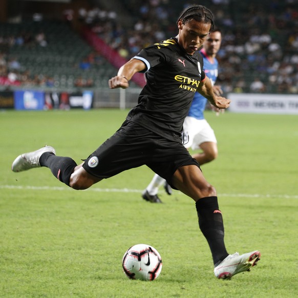 Manchester City's Leroy Sane controls the ball during the friendly soccer match between English Premier League club Manchester City and Hong Kong's Kitchee at a stadium in Hong Kong, Wednesday, July 2 ...