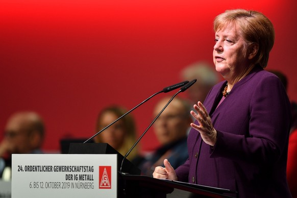 epa07909960 German chancellor Angela Merkel speaks at the IG Metall Gewerkschaftstag in Nuremberg, Germany, 10 October 2019. Germany's biggest workers union holds its 24th convention until saturday, O ...