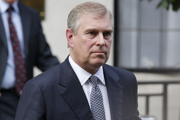 FILE- In this Wednesday, June 6, 2012 file photo, Britain&#039;s Prince Andrew leaves King Edward VII hospital in London after visiting his father Prince Philip. Reacting to U.S. court documents, roya ...