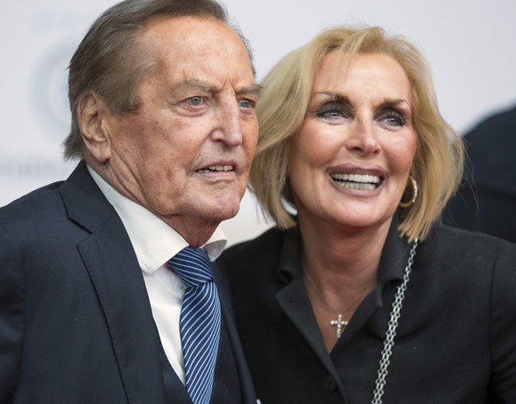 Former president of the German Soccer Association (DFB) Gerhard Mayer-Vorfelder and his wife Margit arrives for the world premiere of &quot;Die Mannschaft&quot; (The Team) at the Sony Center in Berlin ...