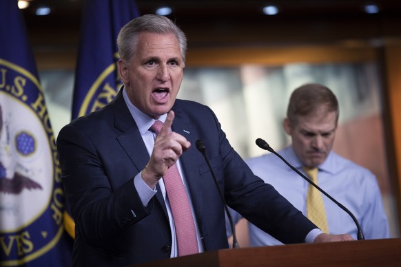 epa09357010 House Minority Leader Kevin McCarthy, Republican Representative from Ohio Jim Jordan (R), delivers remarks during a press conference in the US Capitol in Washington, DC, USA, 21 July 2021. ...