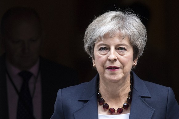 epa06998232 British Prime Minister Theresa May leaves 10 Downing Street in central London, Britain, 05 September 2018 to attend Prime Ministers Questions (PMQs) at the House of Commons. This week mark ...