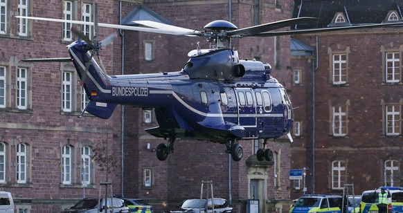 epa12552554 A helicopter of Federal Police officers arrives with the arrested suspect, Ukrainian citizen Serhii K. for his arraignment at the Federal Supreme Court (BGH) in Karlsruhe, Germany, 27 Nove ...