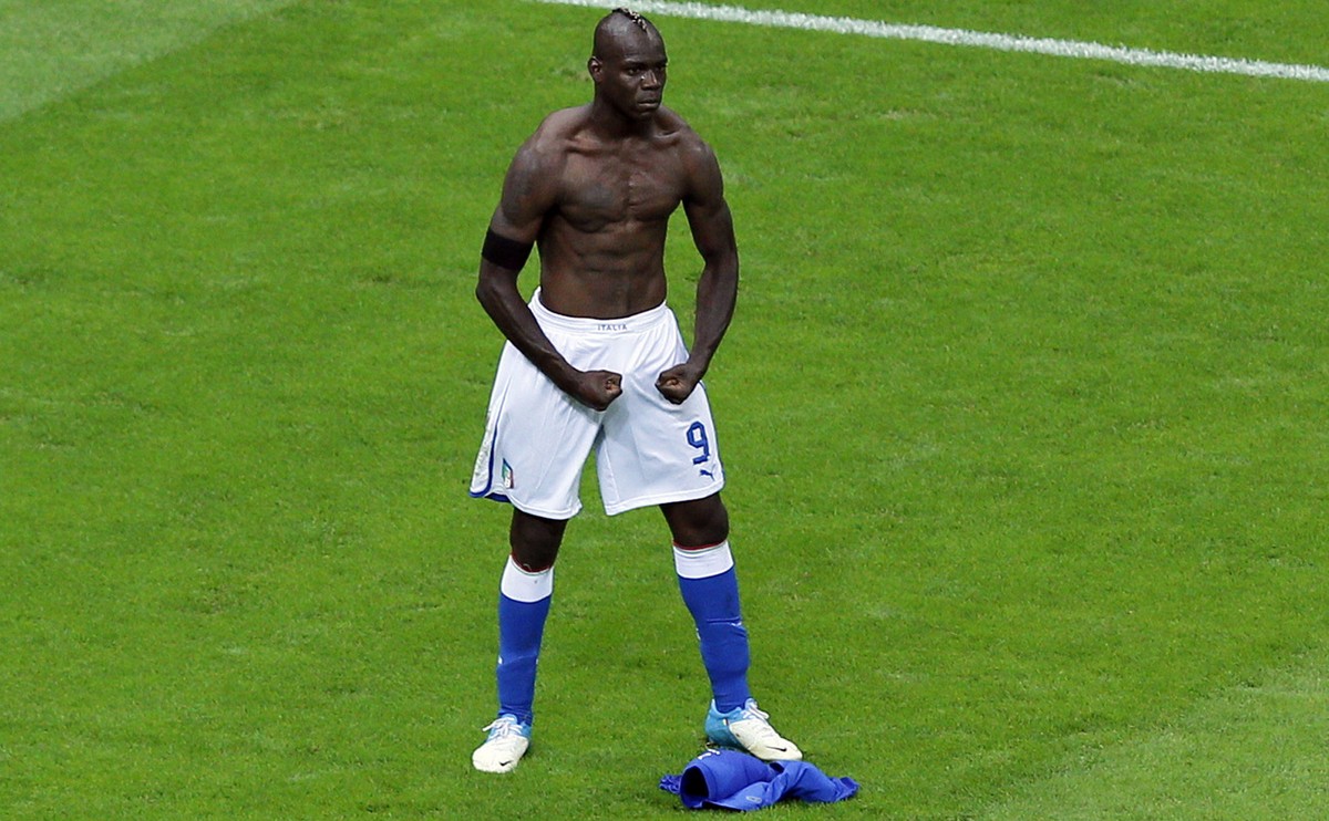 Italy's Mario Balotelli celebrates scoring his side's second goal during the Euro 2012 soccer championship semifinal match between Germany and Italy in Warsaw, Poland, Thursday, June 28, 201 ...