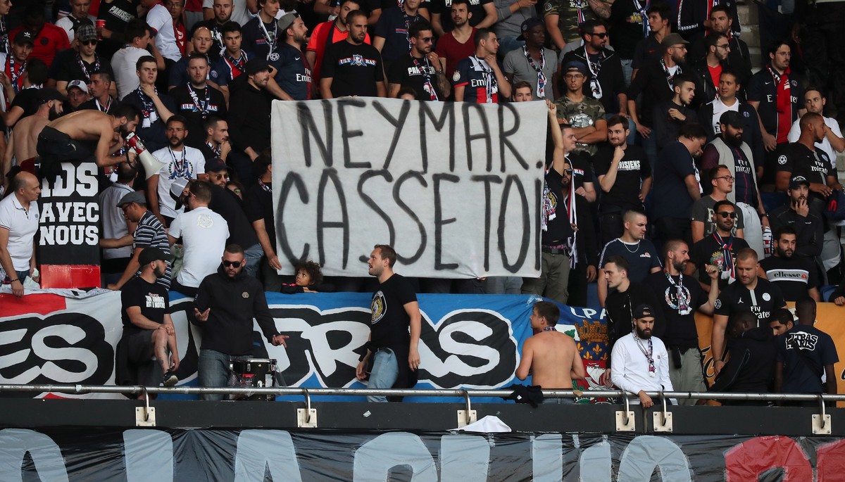 epa07768906 PSG fans display a banner reading 'Neymar Go Away!' prior to the French soccer Ligue 1 match between Paris Saint Germain (PSG) and Nimes at the Parc des Princes stadium in Paris, ...