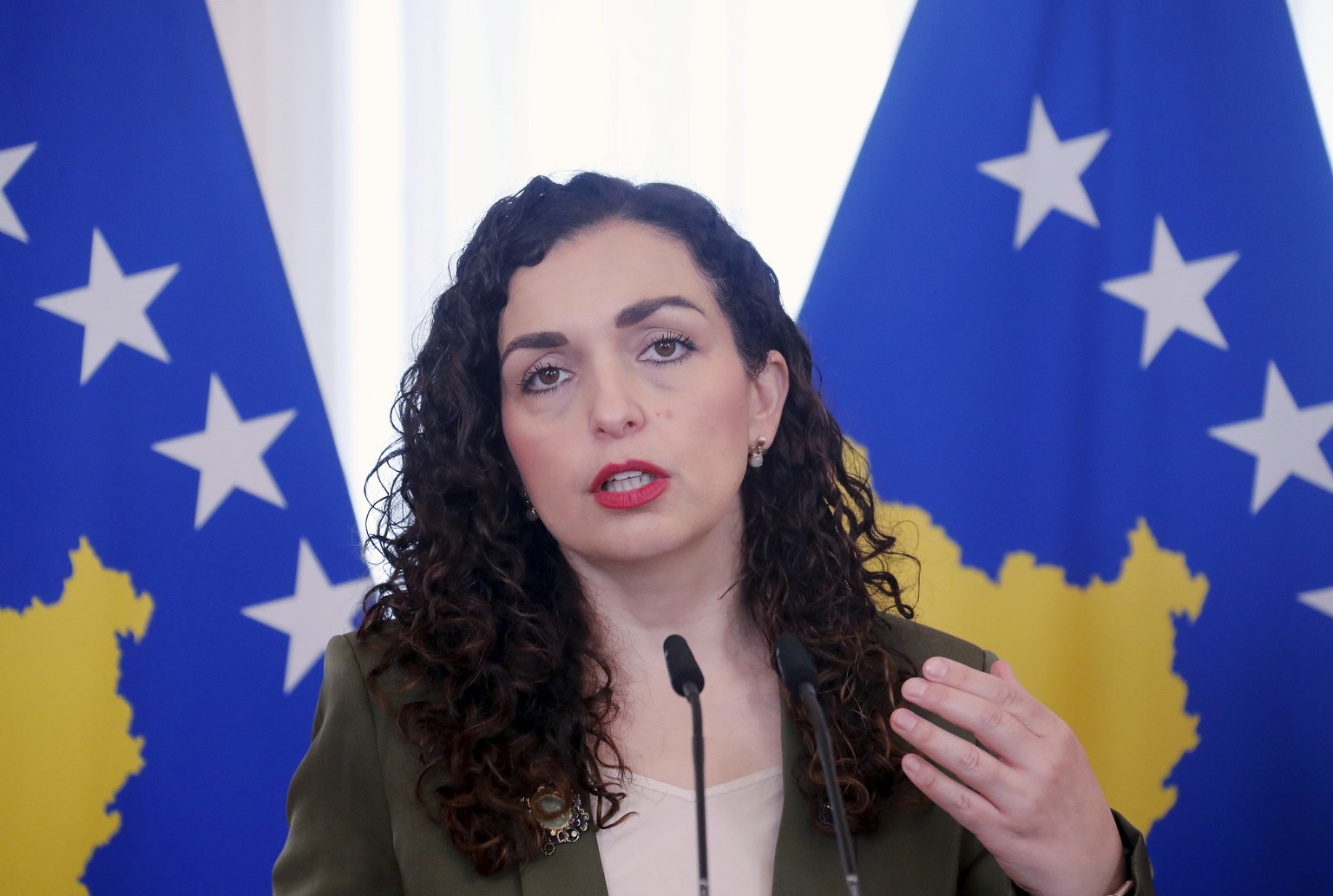 epa12239004 President of Kosovo Vjosa Osmani speaks during a joint press conference after her meeting with President of Latvia Edgars Rinkevics (not pictured) in Riga, Latvia, 15 July 2025. During the ...