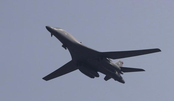 U.S. B-1 bomber flies over Osan Air Base in Pyeongtaek, South Korea, Tuesday, Sept. 13, 2016. The United States on Tuesday sent nuclear-capable supersonic bombers streaking over ally South Korea in a  ...