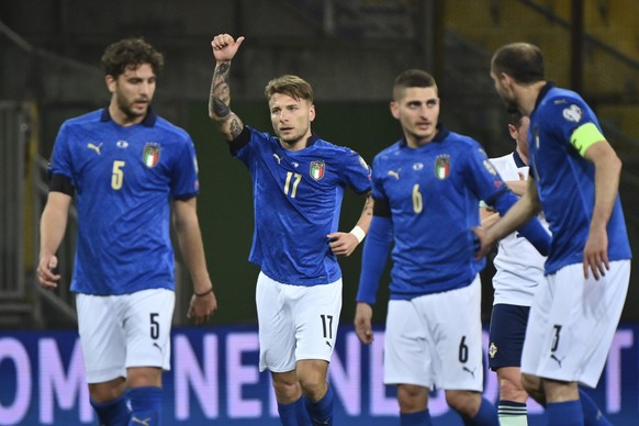 Italy's Ciro Immobile celebrates after scoring his team's second goal during the World Cup 2022 qualifier group c soccer game between Italy and Northern Ireland at the Stadio Ennio Tardini i ...
