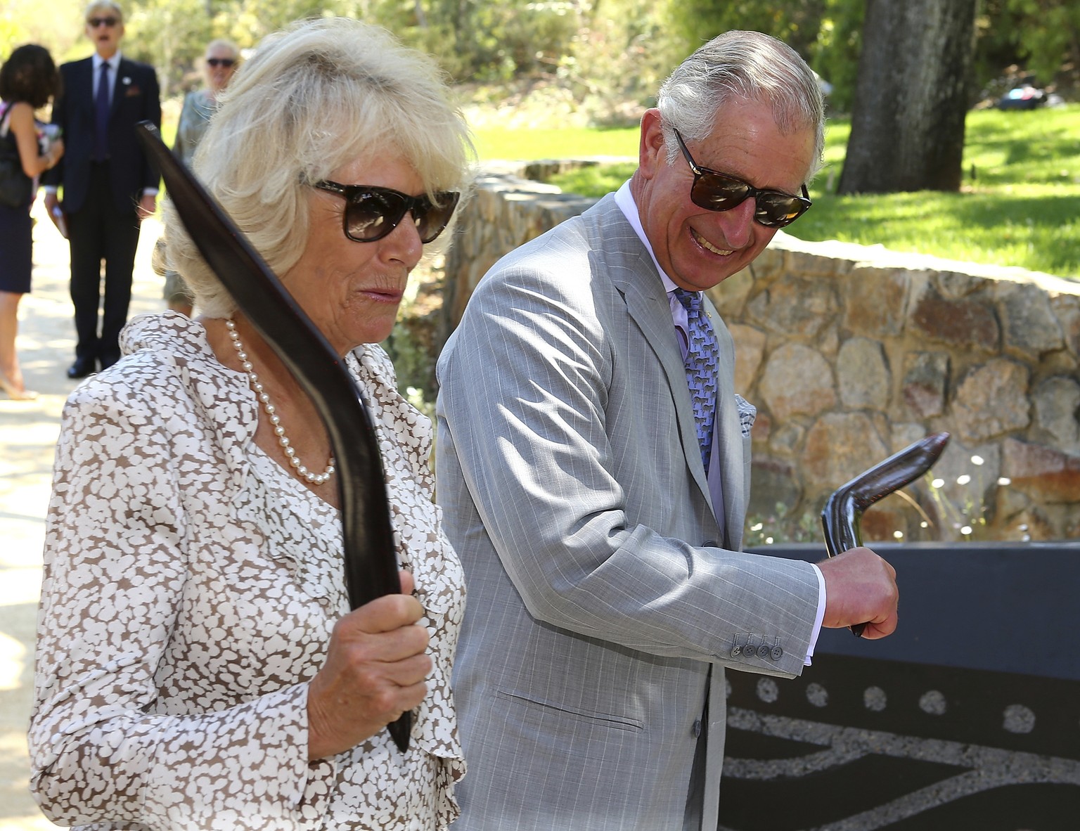 FILE - Britain&#039;s Prince Charles, right, and his wife Camilla, Duchess of Cornwall, hold boomerangs while visiting Kings Park in Perth, Australia, Sunday, Nov. 15, 2015. (Paul Kane/Pool Photo via  ...