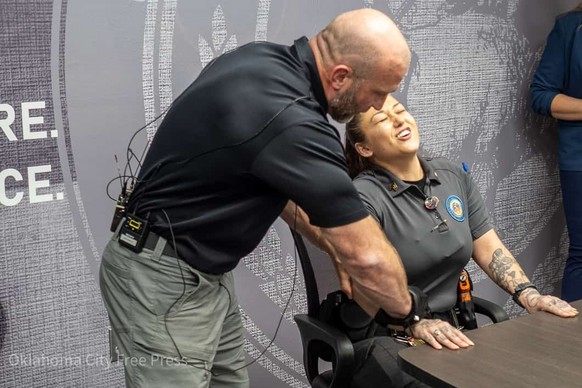 This photo provided by the Oklahoma City Free Press shows Justin Morris demonstrating the G.L.O.V.E. at the Oklahoma County Detention Center in Oklahoma City, March 22, 2023. (Brett Dickerson/Oklahoma ...