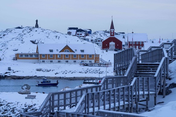 A boat travels at the sea inlet in Nuuk, Greenland, on Tuesday, Jan. 13, 2026. (AP Photo/Evgeniy Maloletka)
Greenland Daily Life