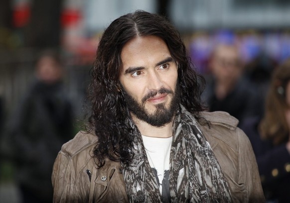 epa03258365 Russel Brand arrives for the European premier of Rock of Ages at the Odeon theatre in London, Britain, 10 June 2012. EPA/KAREL PRINSLOO