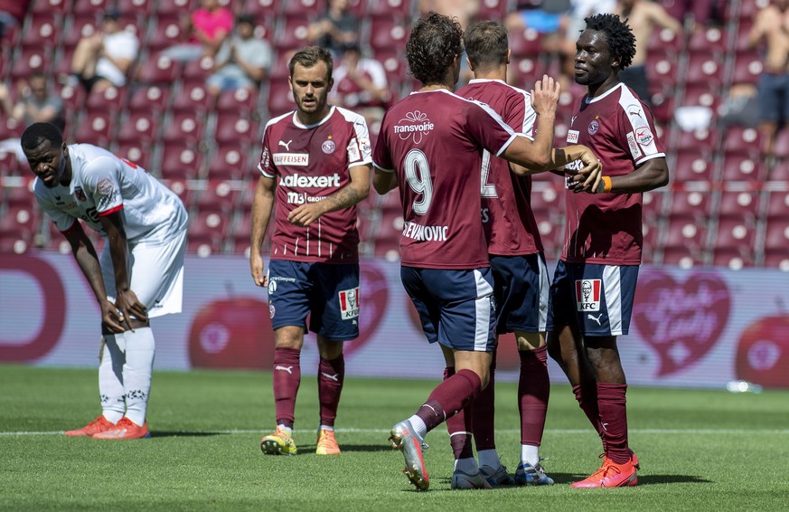 Les joueurs Genevois laissent eclater leur joie, lors de la rencontre de football de Super League entre le Geneve Servette FC et le Neuchatel Xamax FCS, ce dimanche 26 juillet 2020 au stade de Geneve. ...