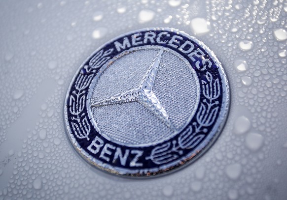 epa07486360 (FILE) - A logo of car maker Mercedes Benz is pictured on a new car at the port of Bremerhaven, northern Germany, 03 March 2017 (reissued 05 April 2019). Media reports on 05 April 2019 sta ...