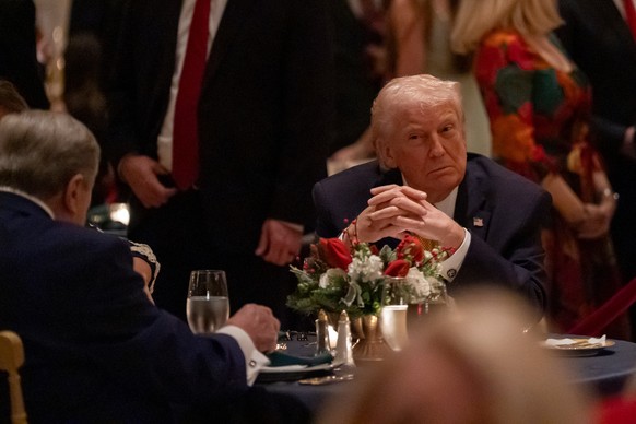 President Donald Trump sits during Christmas Eve dinner at his Mar-a-Lago club, Wednesday, Dec. 24, 2025, in Palm Beach, Fla. (AP Photo/Alex Brandon)
Donald Trump