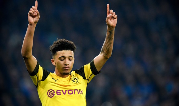 epa07217628 Dortmund&#039;s Jadon Sancho celebrates after scoring the 2-1 lead during the German Bundesliga soccer match between FC Schalke 04 and Borussia Dortmund in Gelsenkirchen, Germany, 08 Decem ...