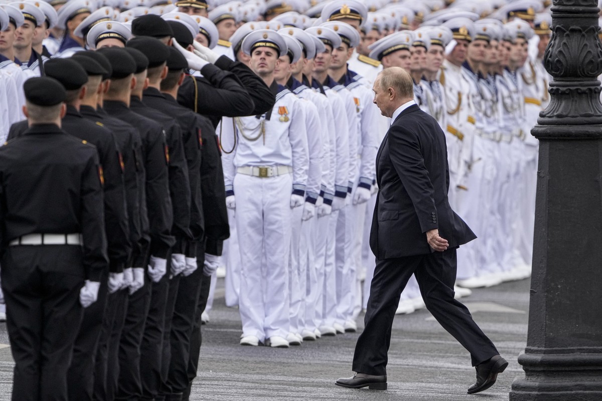 Russian President Vladimir Putin arrives to attend the military parade during Navy Day celebrations, in St.Petersburg, Russia, Sunday, July 31, 2022. (AP Photo/Dmitri Lovetsky)