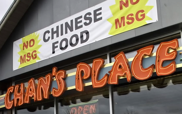 "No MSG" - Asian Restaurants trying to cater to western perceptions. 
https://www.youtube.com/@ChineseCookingDemystified