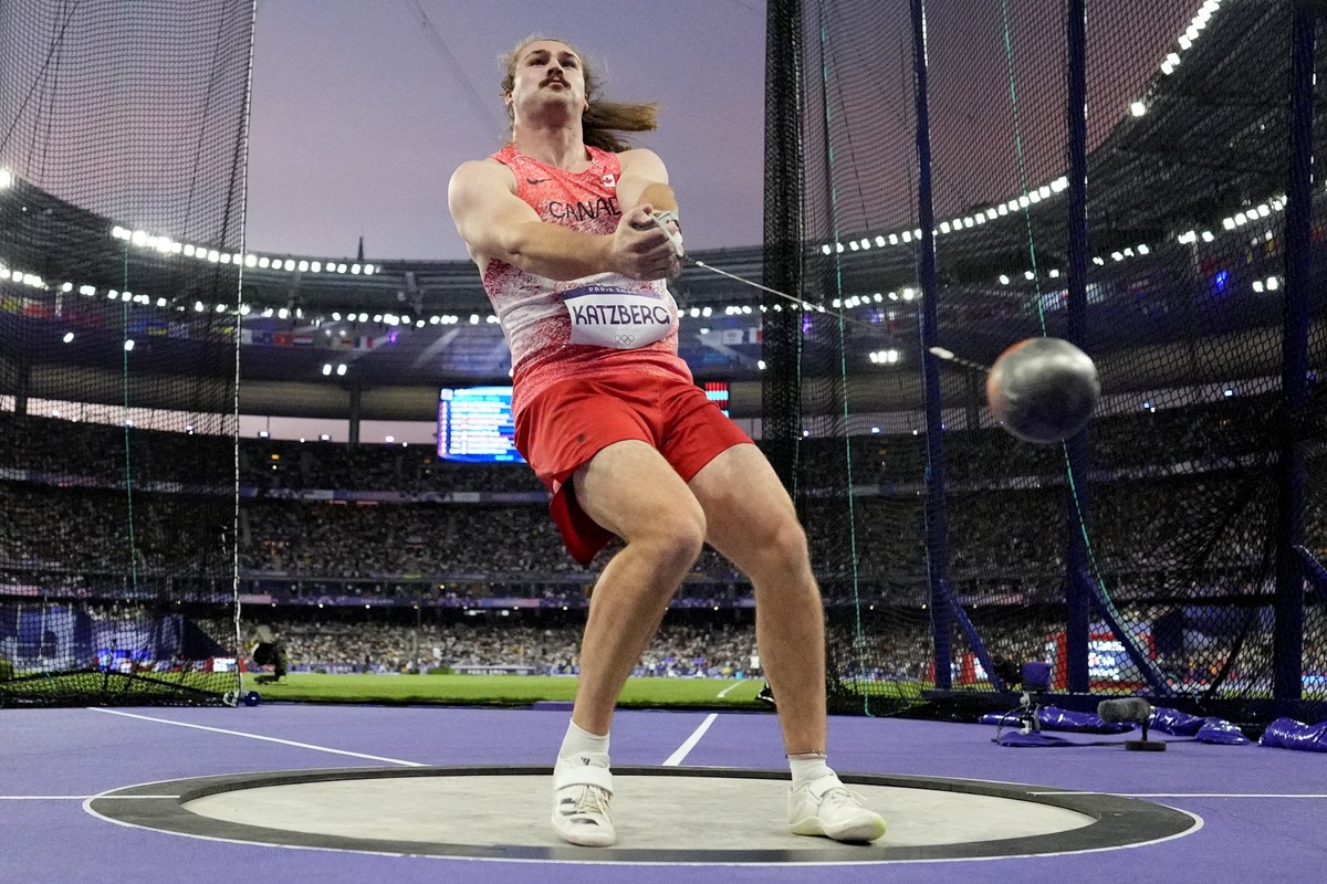 Ethan Katzberg, of Canada, competes in the men's hammer throw final at the 2024 Summer Olympics, Sunday, Aug. 4, 2024, in Saint-Denis, France. (AP Photo/Bernat Armangue)
Ethan Katzberg