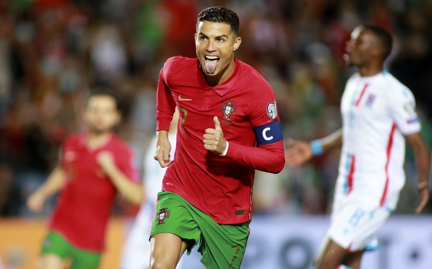 Portugal&#039;s Cristiano Ronaldo celebrates after scoring his side&#039;s second goal during the World Cup 2022 group A qualifying soccer match between Portugal and Luxembourg at the Algarve stadium  ...