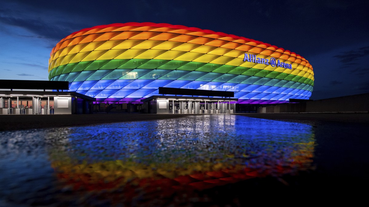 The Allianz Arena lights up in rainbow colors on the occasion of Christopher Street Day, in Munich, Germany, Saturday, July 10, 2021. Due to the coronavirus pandemic, the big parade was cancelled agai ...