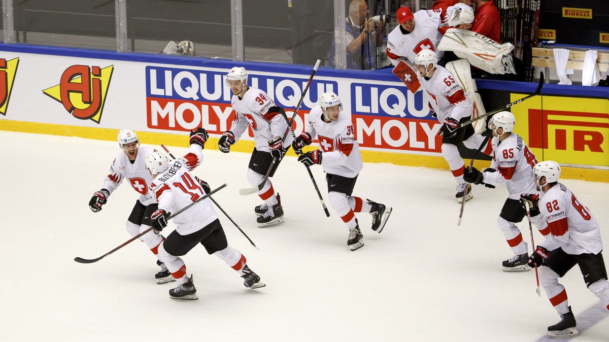 Switzerland's players celebrate their victory after beating Finland, during the IIHF 2018 World Championship quarter final game between Finland and Switzerland, at the Jyske Bank Boxen, in Hernin ...