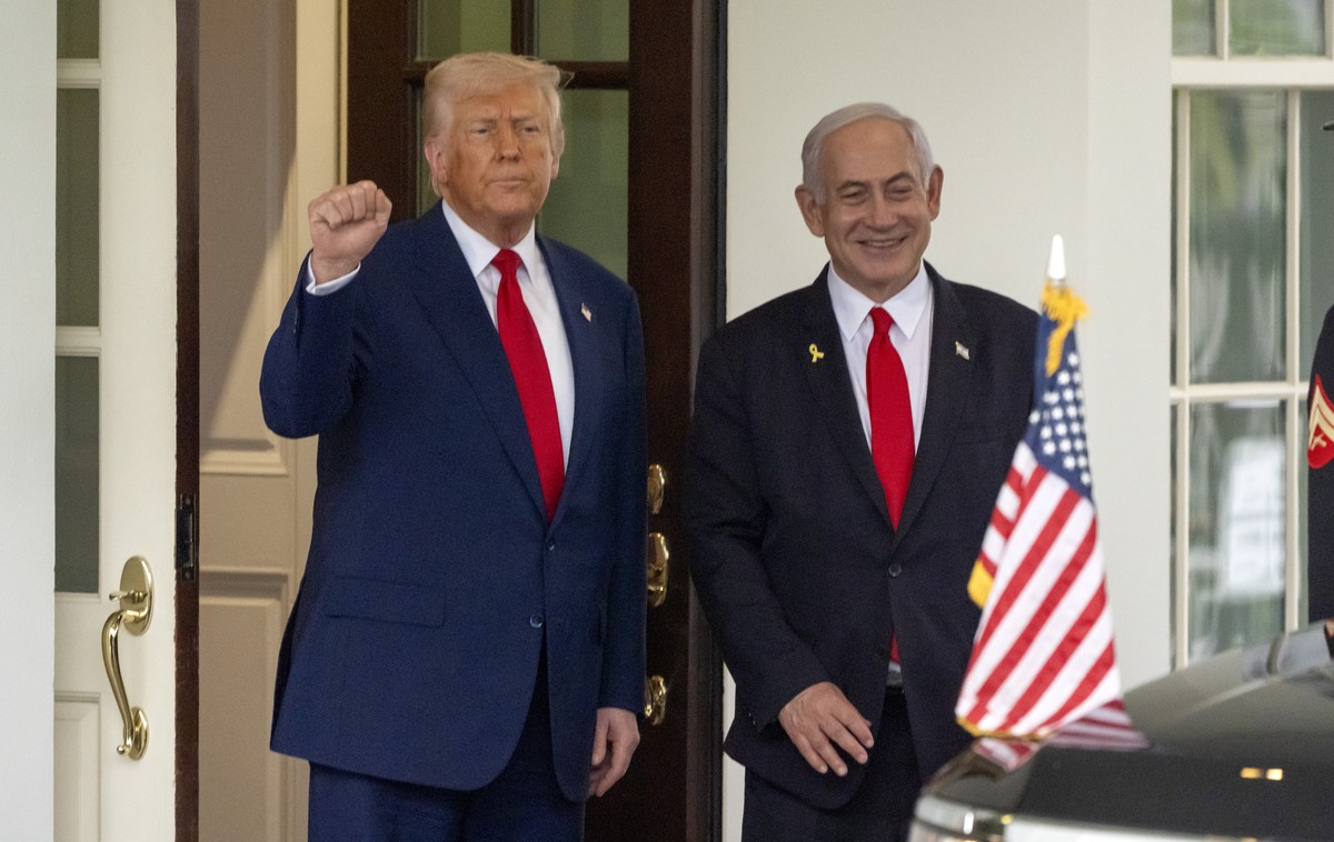 FILE - President Donald Trump, left, stands with Israel's Prime Minister Benjamin Netanyahu at the West Wing of the White House, April 7, 2025, in Washington. (AP Photo/Mark Schiefelbein, File)
D ...