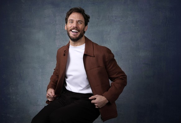Sam Claflin, a cast member in the streaming miniseries "daisy jones and the six," poses for a portrait at the Four Seasons Hotel, Tuesday, February 21, 2023, in Los Angeles.  (AP Photo/Chris Pizza...
